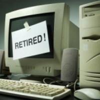 Computer with a "Retired!" sign