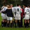 sports team in a huddle