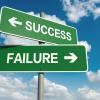 Signs pointing toward success one way and failure the other