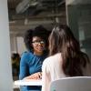 Woman being interviewed for a job as a software tester