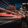 Long-exposure shot of cars racing along a highway