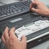 Blind person using a Braille screen reader