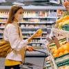 Woman wearing a mask going grocery shopping